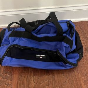 Polo sport Ralph Lauren blue black duffle bag. See pics for marks